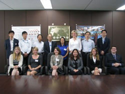 Commemorative pictures of HCM employees and Augustana College officials