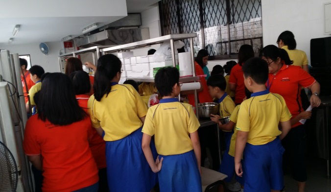 Queuing patiently for the baking ingredients