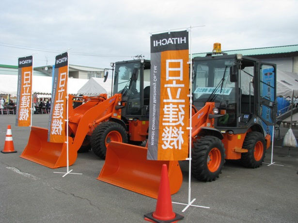 Wheel loaders lined up on display