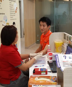 Undergoing Haemoglobin test and medical screening