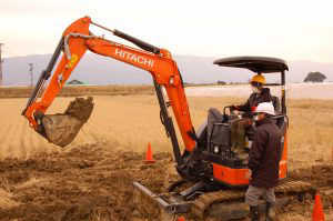 Practical training using a mini excavator