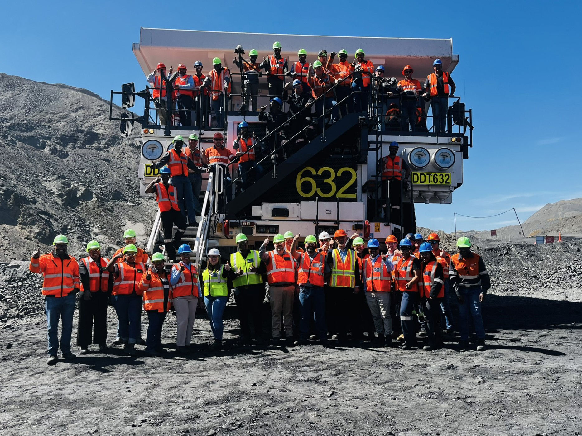 Commemorative photo in front of the recently shipped EH3500AC-3