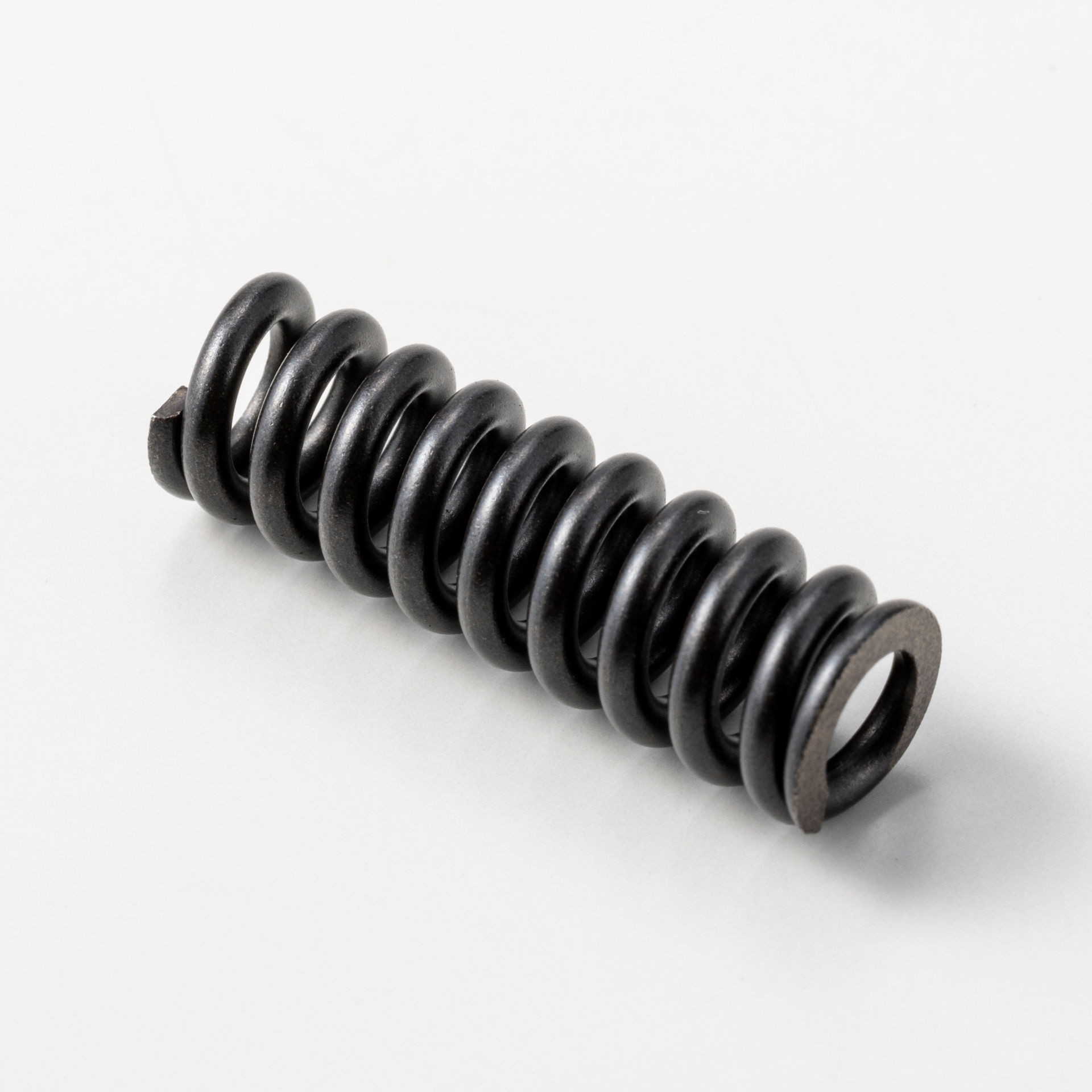 TRAVEL MOTOR SPRING