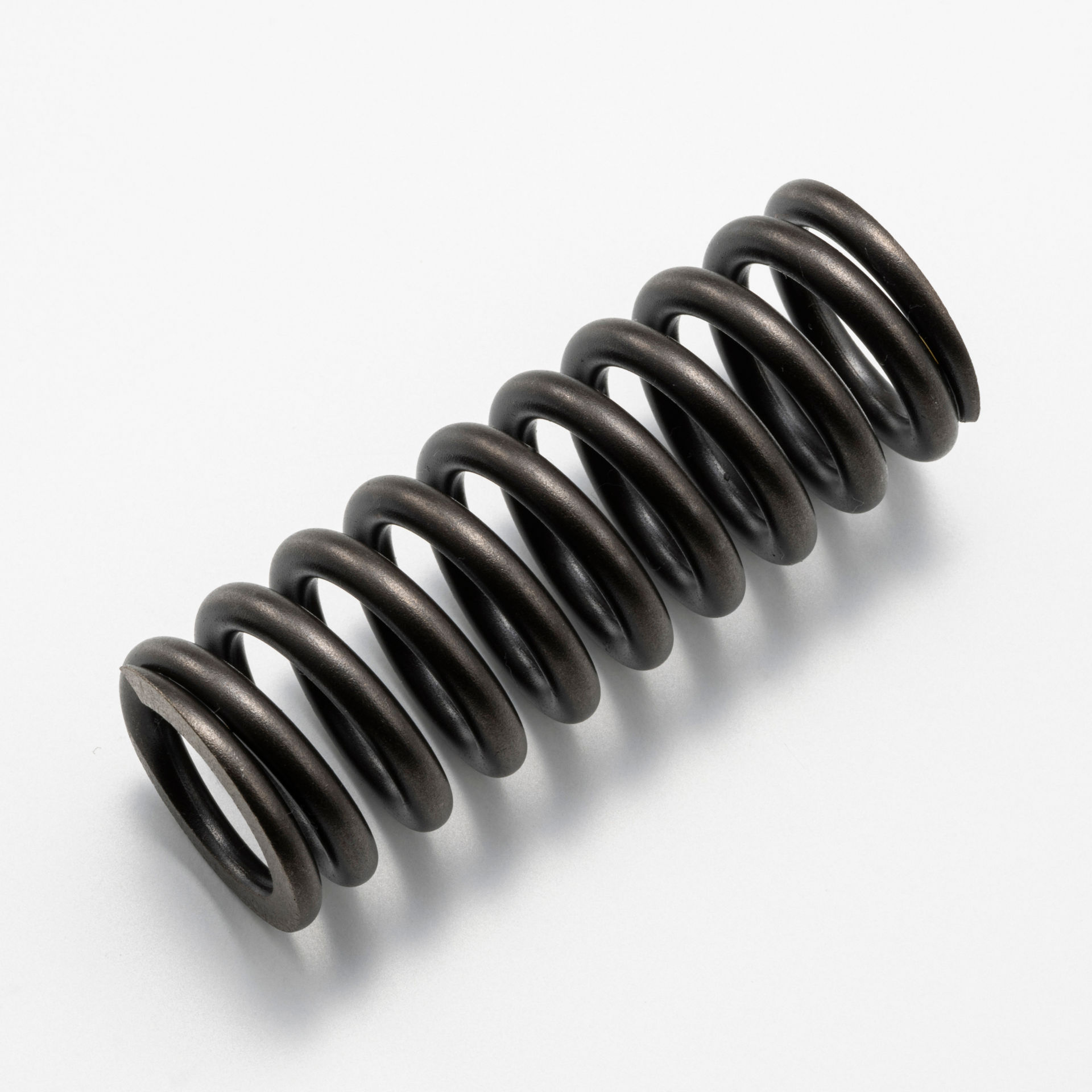 TRAVEL DEVICE SPRING