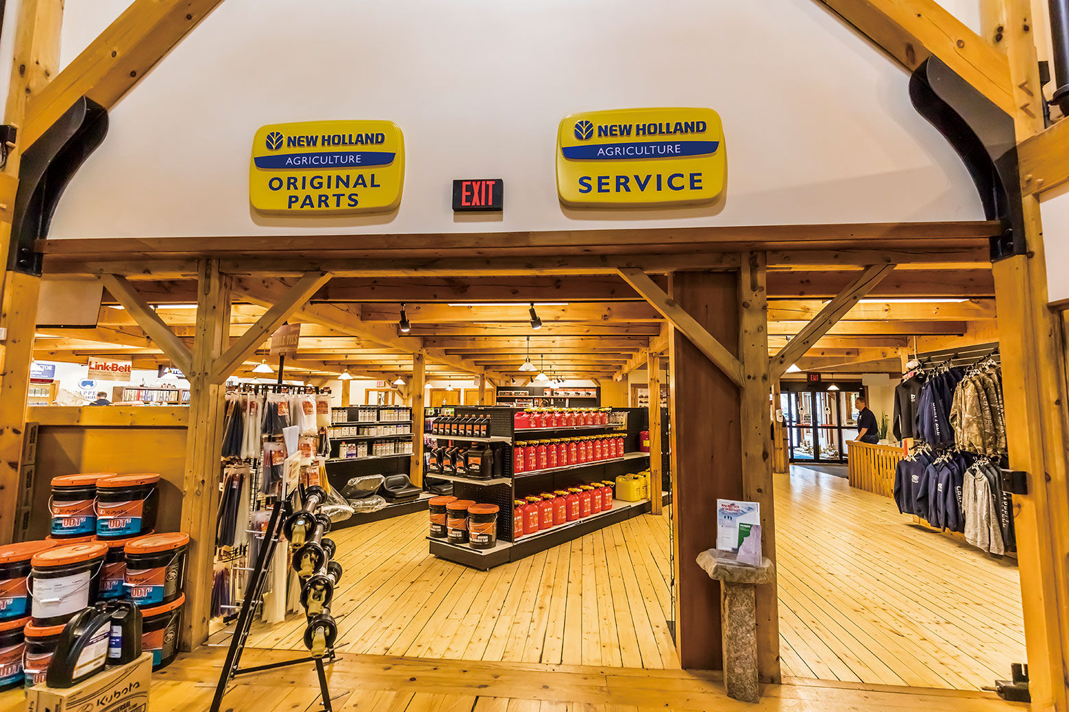 Goods and apparel related to construction machinery are lined up neatly in the shop.